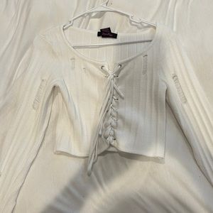 white long sleeve with rips and tied up